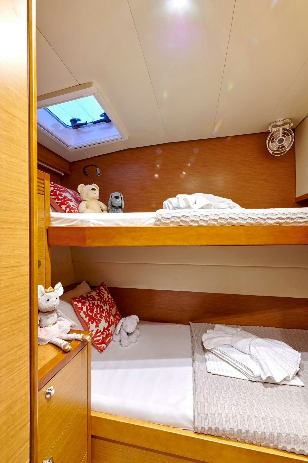 a shelf with stuffed animals on it aboard GOLDEN PEARL Yacht for Charter