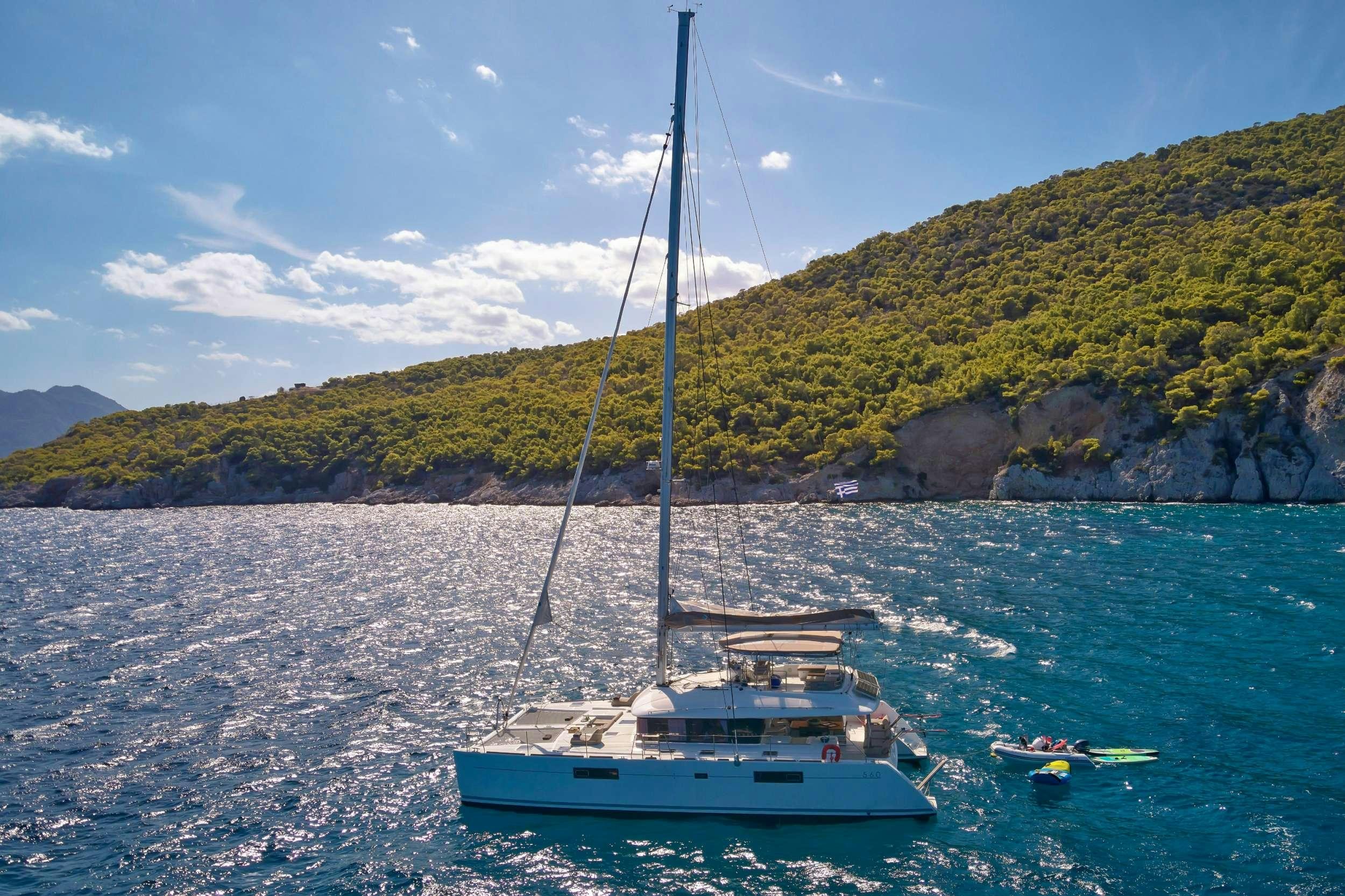 a sailboat on the water aboard GOLDEN PEARL Yacht for Charter
