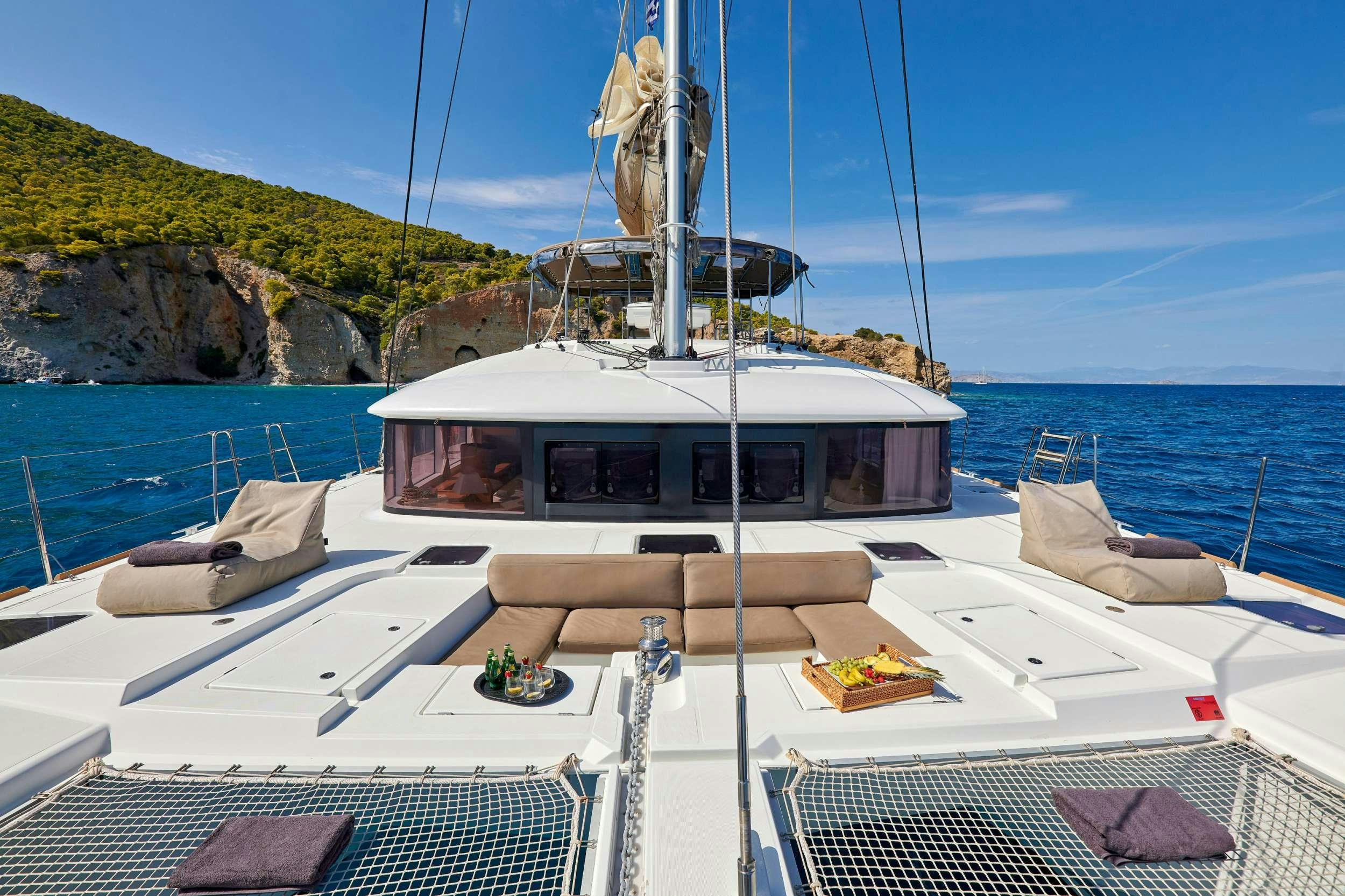 a boat on a beach aboard GOLDEN PEARL Yacht for Charter