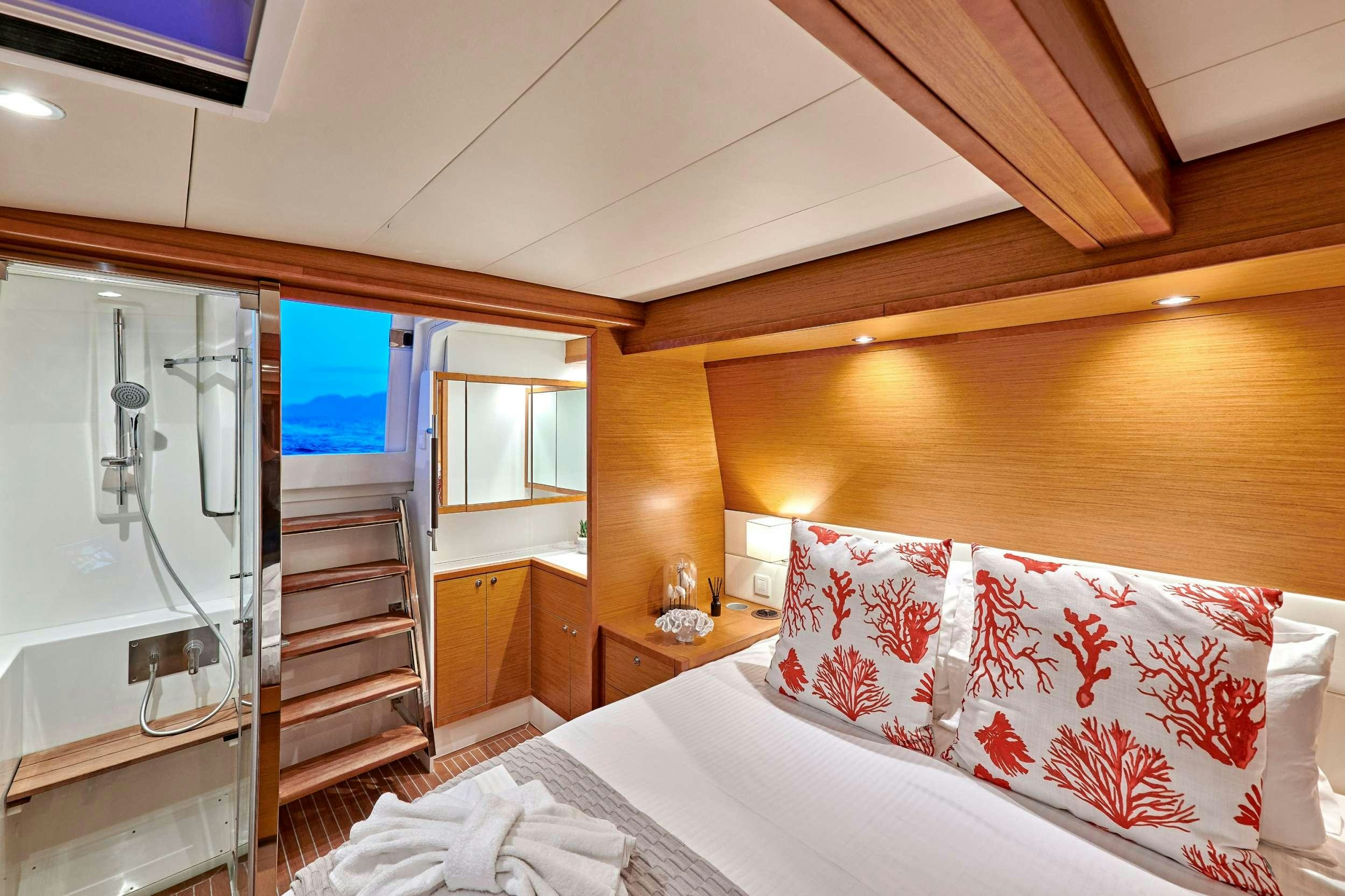 a bedroom with a bunk bed aboard GOLDEN PEARL Yacht for Charter