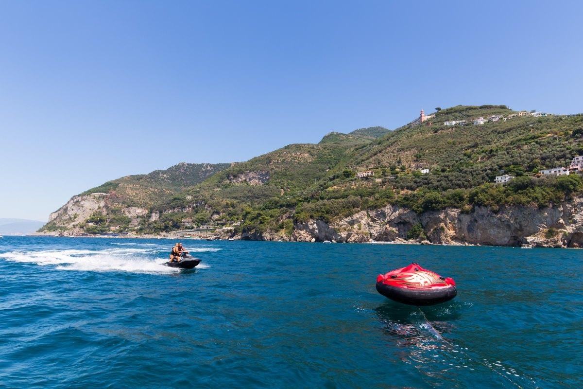 a person in a boat in the water aboard CINQUE Yacht for Charter