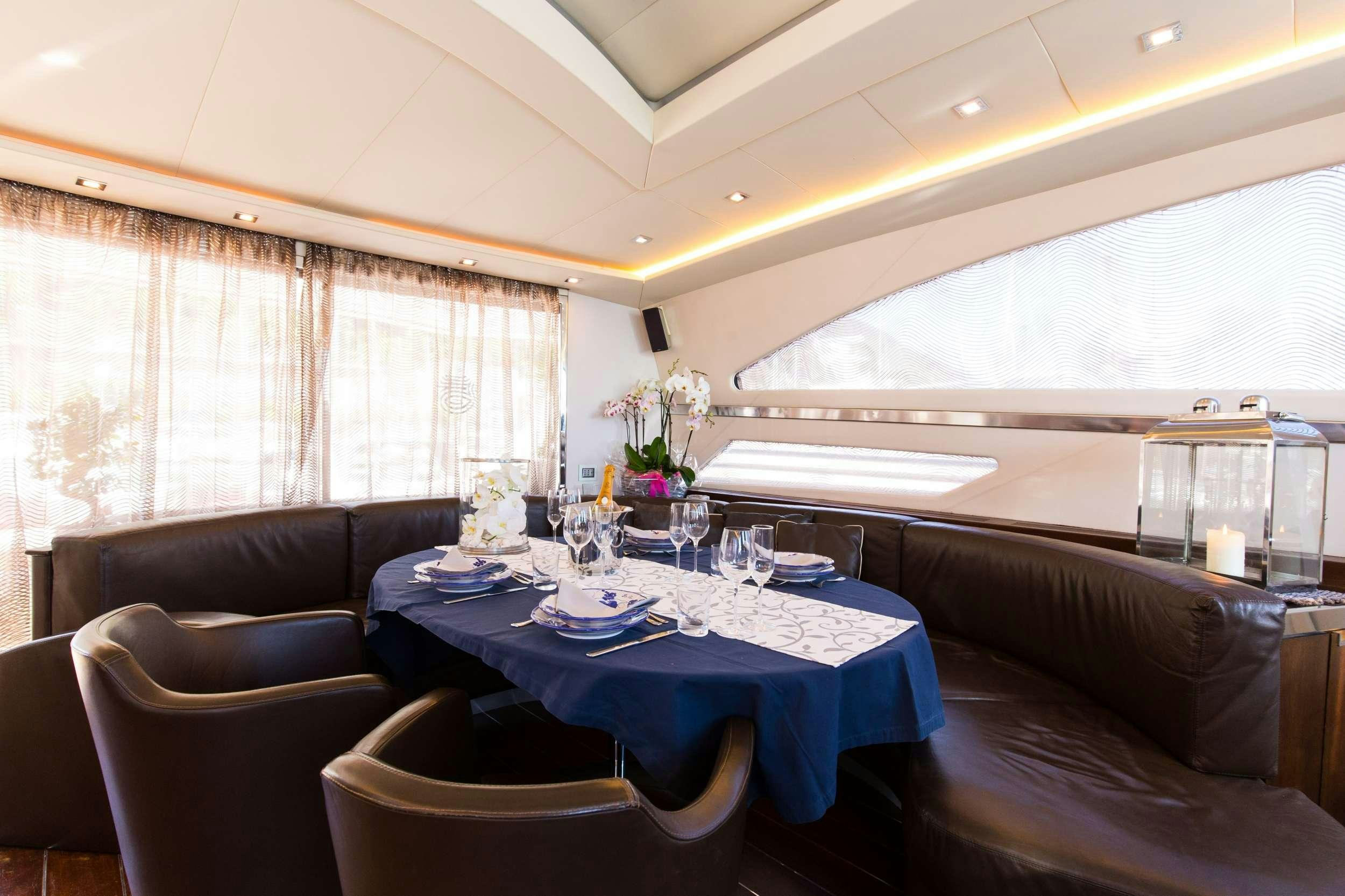 a dining table in a train aboard CINQUE Yacht for Charter
