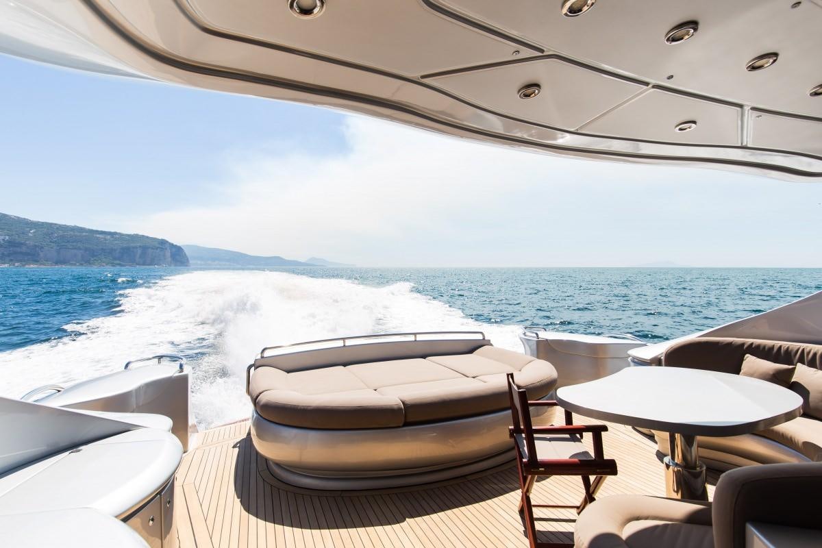 a boat on a deck aboard CINQUE Yacht for Charter
