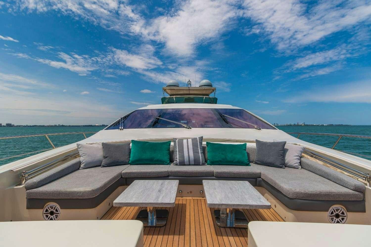 a boat on a deck aboard Scarlet Yacht for Charter