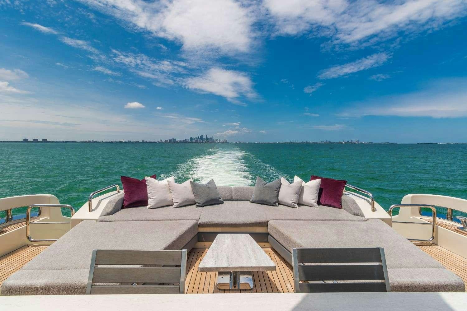 a large lounge chair on a boat aboard Scarlet Yacht for Charter