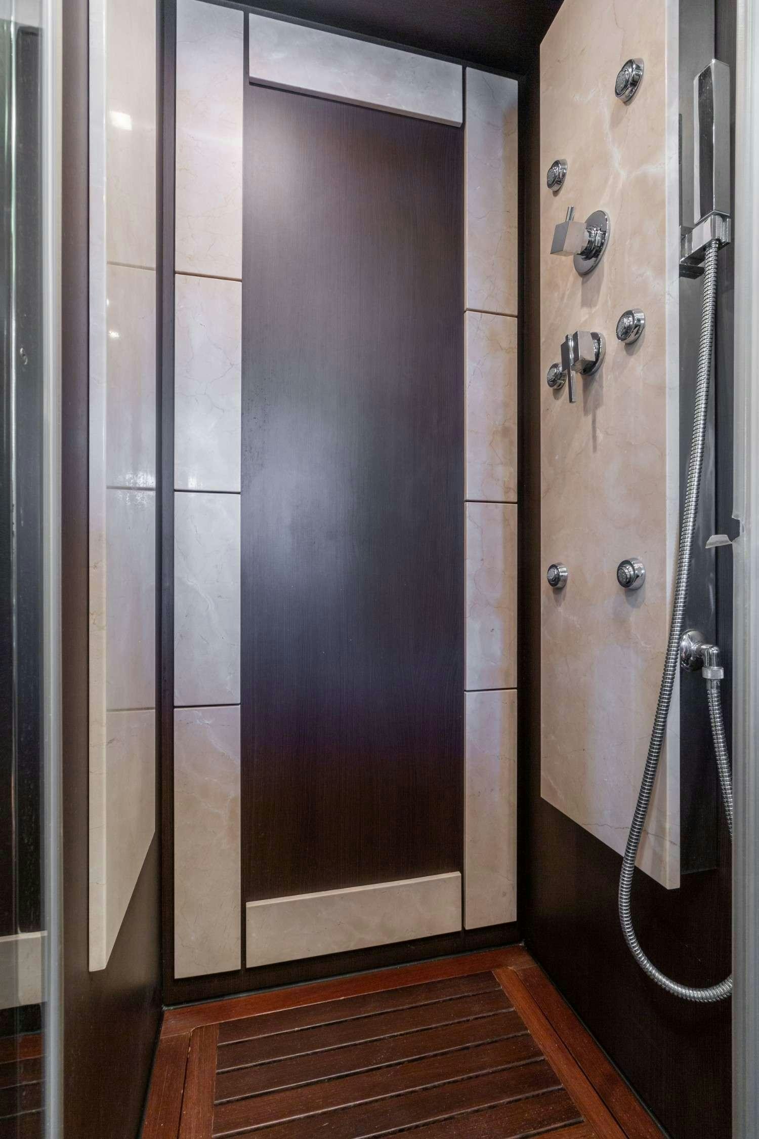 a large metal door aboard Scarlet Yacht for Charter