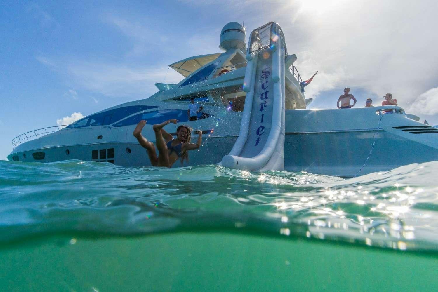 a person jumping out of a plane aboard Scarlet Yacht for Charter