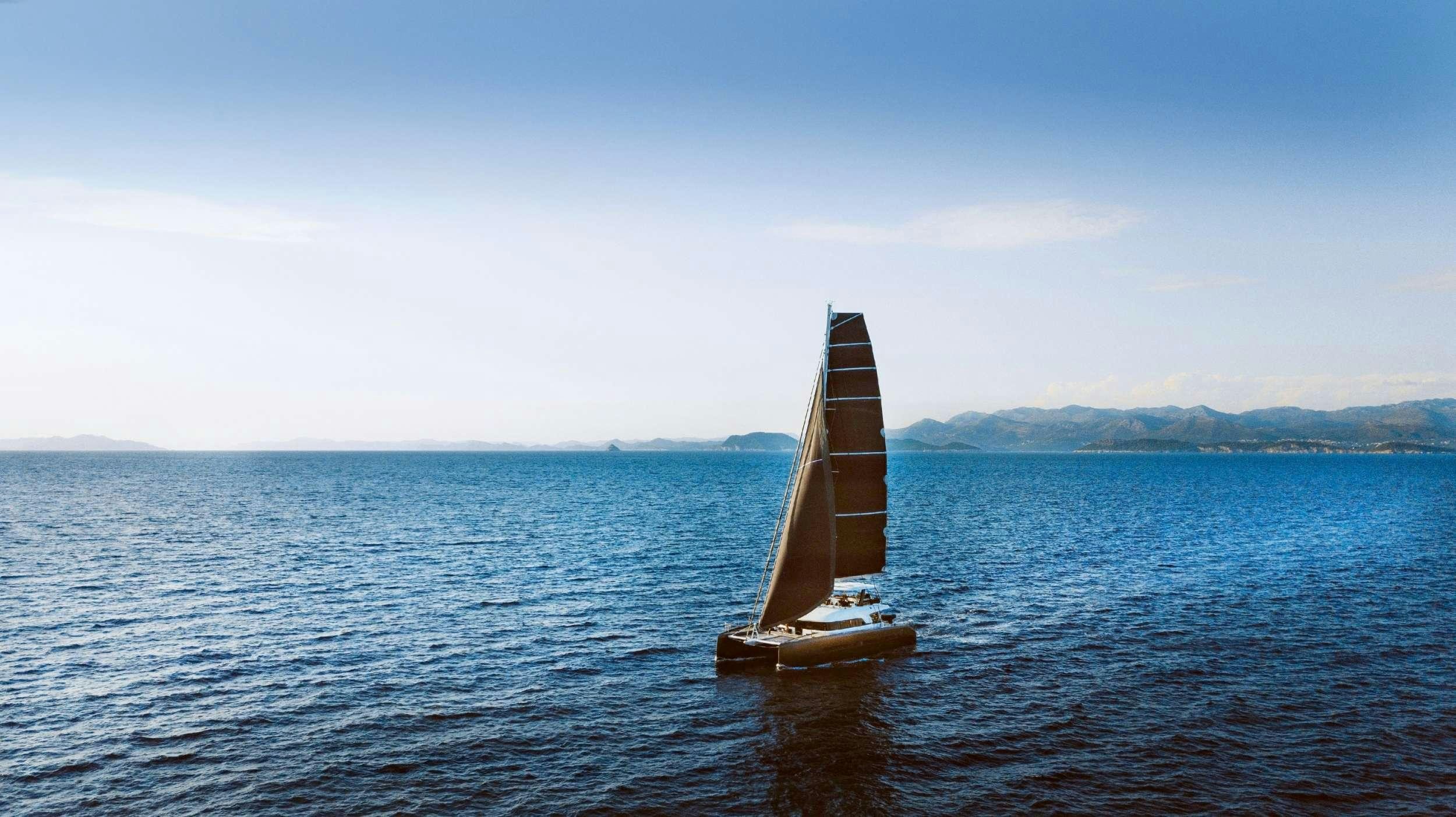a sailboat on the water aboard LA GATTA Yacht for Charter