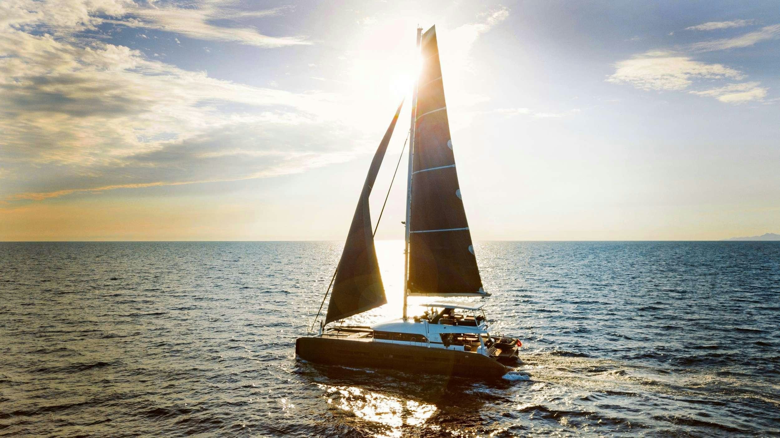a sailboat on the water aboard LA GATTA Yacht for Charter