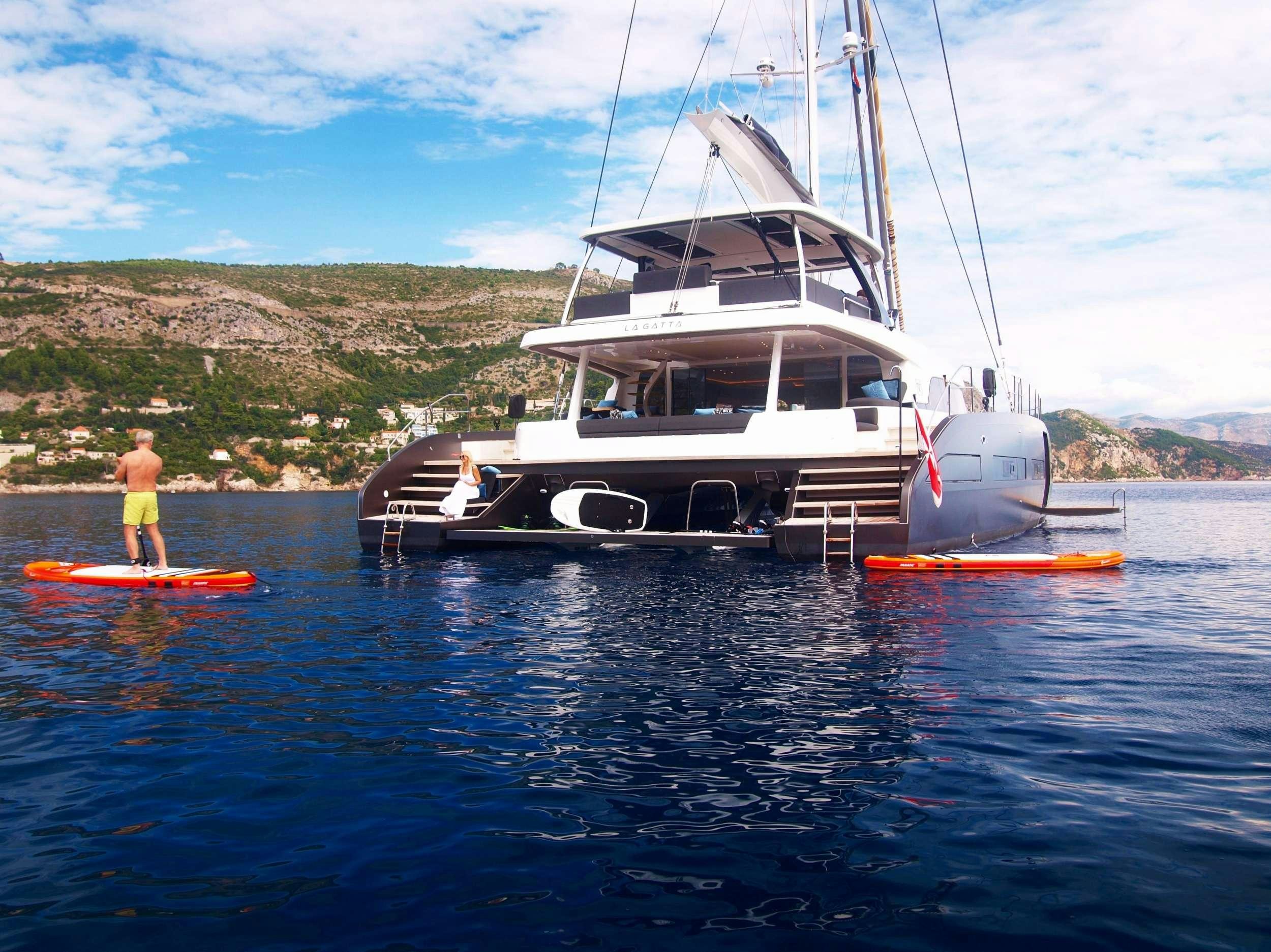 a boat on the water aboard LA GATTA Yacht for Charter