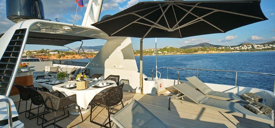 a boat on the water aboard OBSESION 120 Yacht for Charter