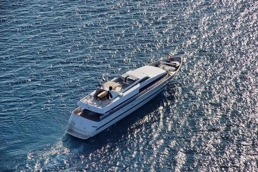a boat in the water aboard OBSESION 120 Yacht for Charter