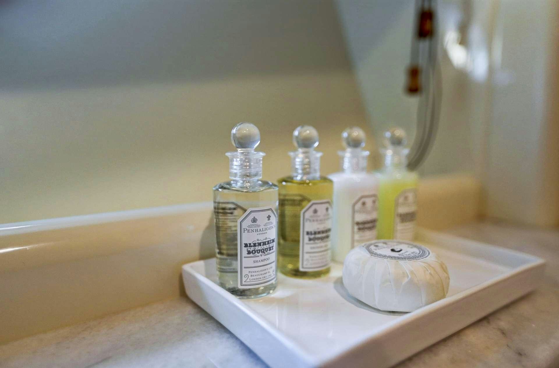 a group of bottles on a shelf aboard ALSIUM Yacht for Charter