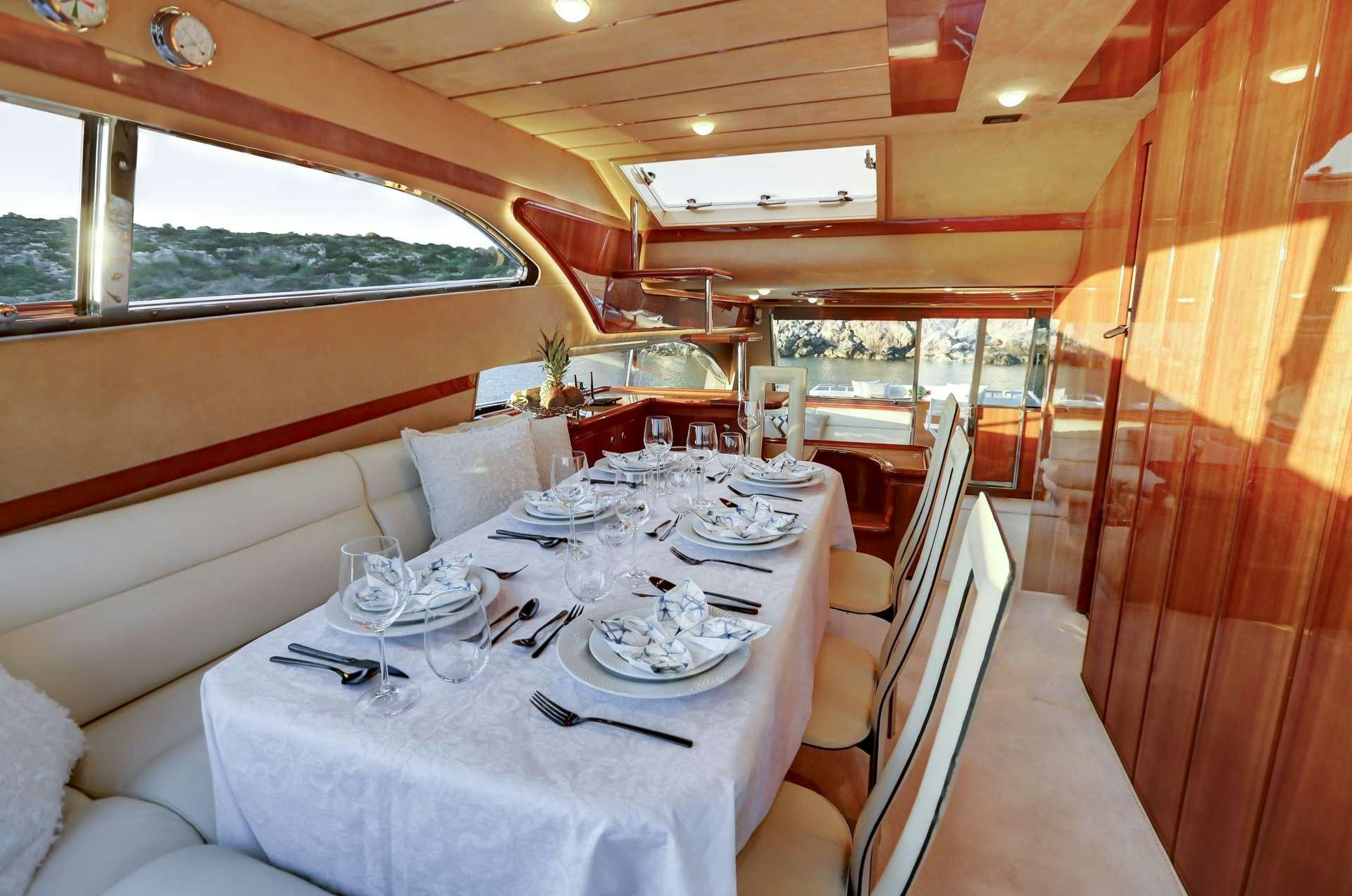 a dining table set for a meal aboard ALSIUM Yacht for Charter