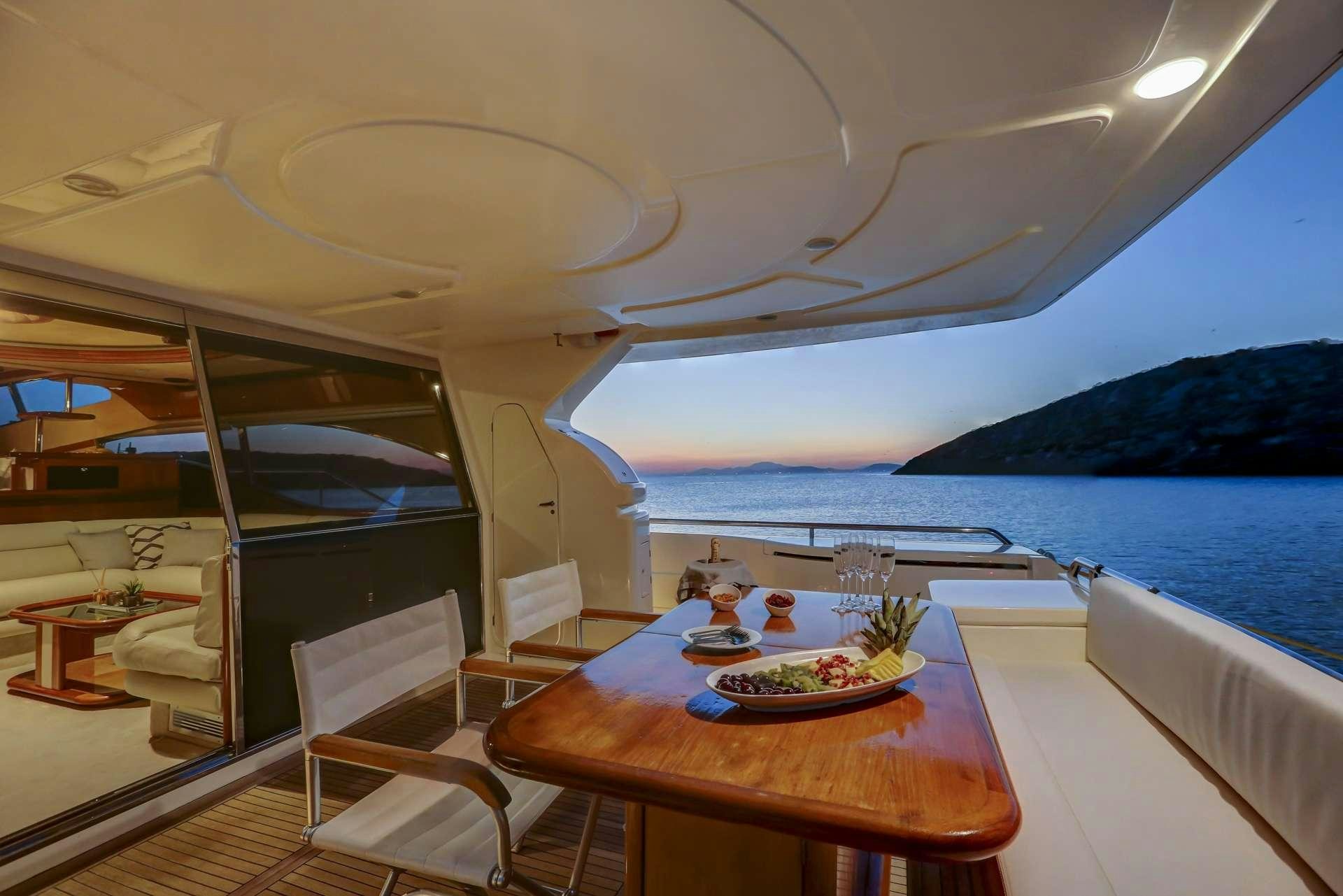 a dining table on a boat aboard ALSIUM Yacht for Charter