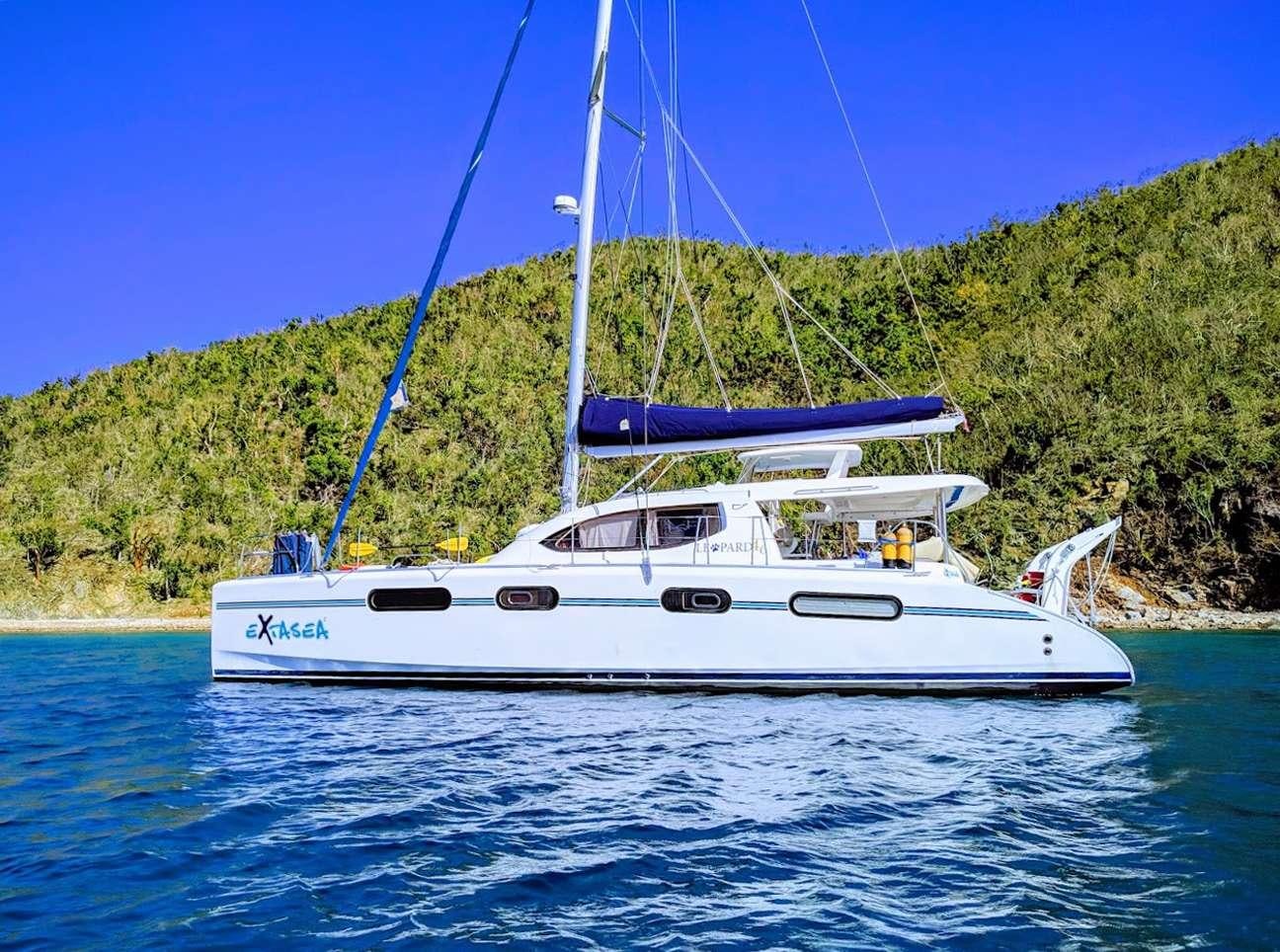 a white boat on water aboard EXTASEA 2 Yacht for Charter