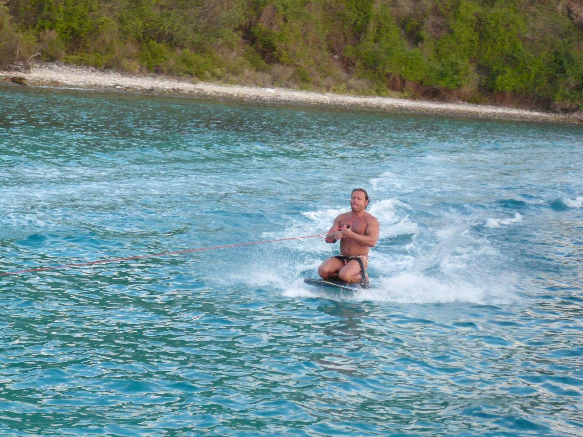 a person water skiing aboard EXTASEA 2 Yacht for Charter
