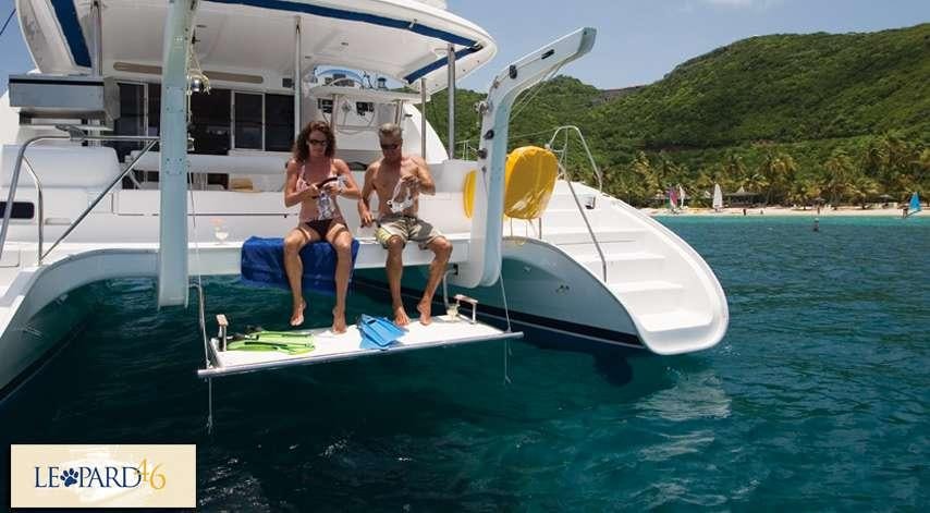 a couple of people sitting on a boat in the water aboard EXTASEA 2 Yacht for Charter