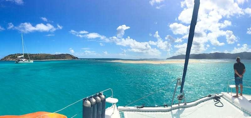 a person standing on a boat aboard EXTASEA 2 Yacht for Charter