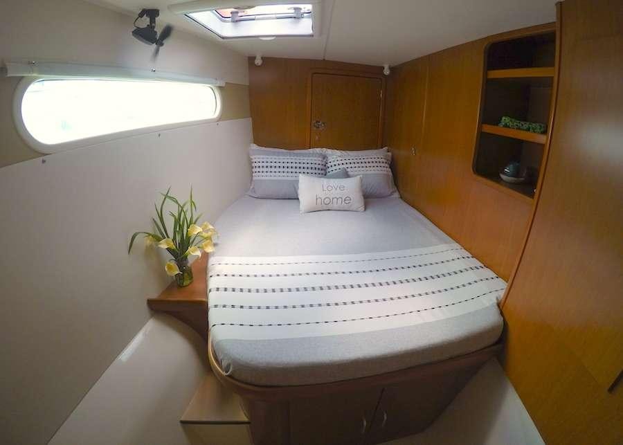 a bed in a room aboard EXTASEA 2 Yacht for Charter