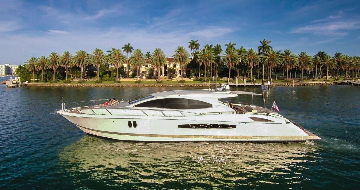 a white boat in the water aboard CARPE DIEM Yacht for Charter