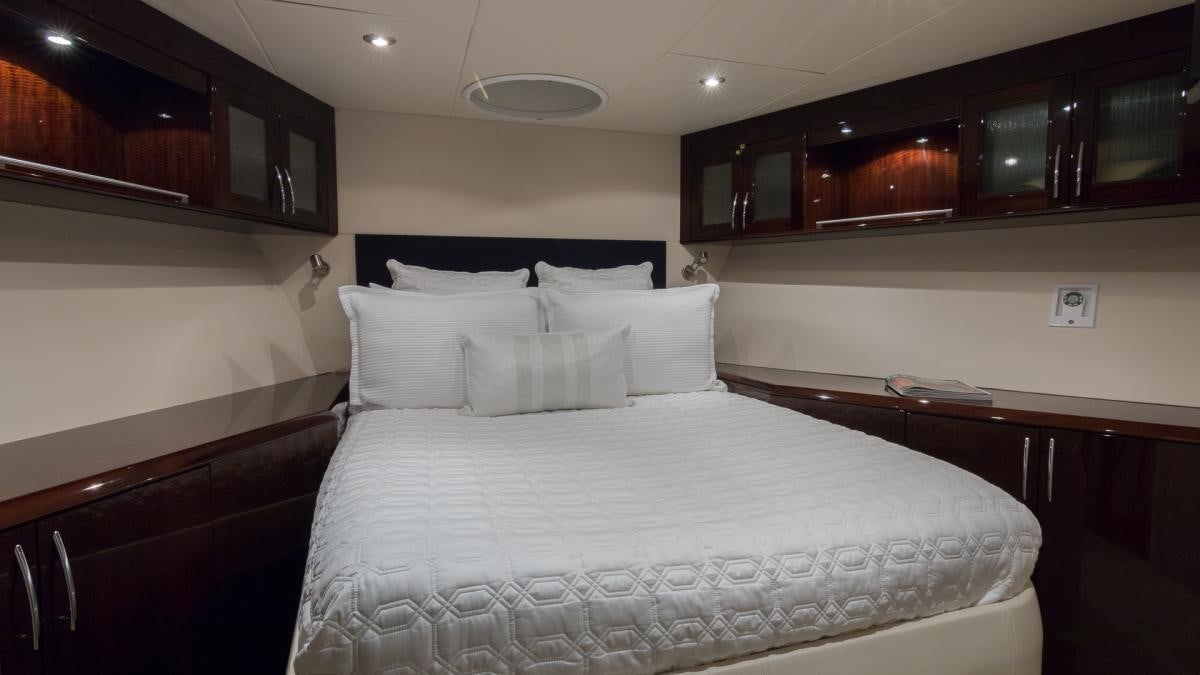 a large bed in a room aboard CARPE DIEM Yacht for Charter