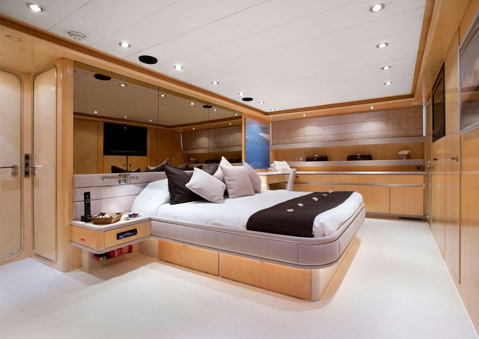a bed in a room aboard SUNLINER X Yacht for Charter