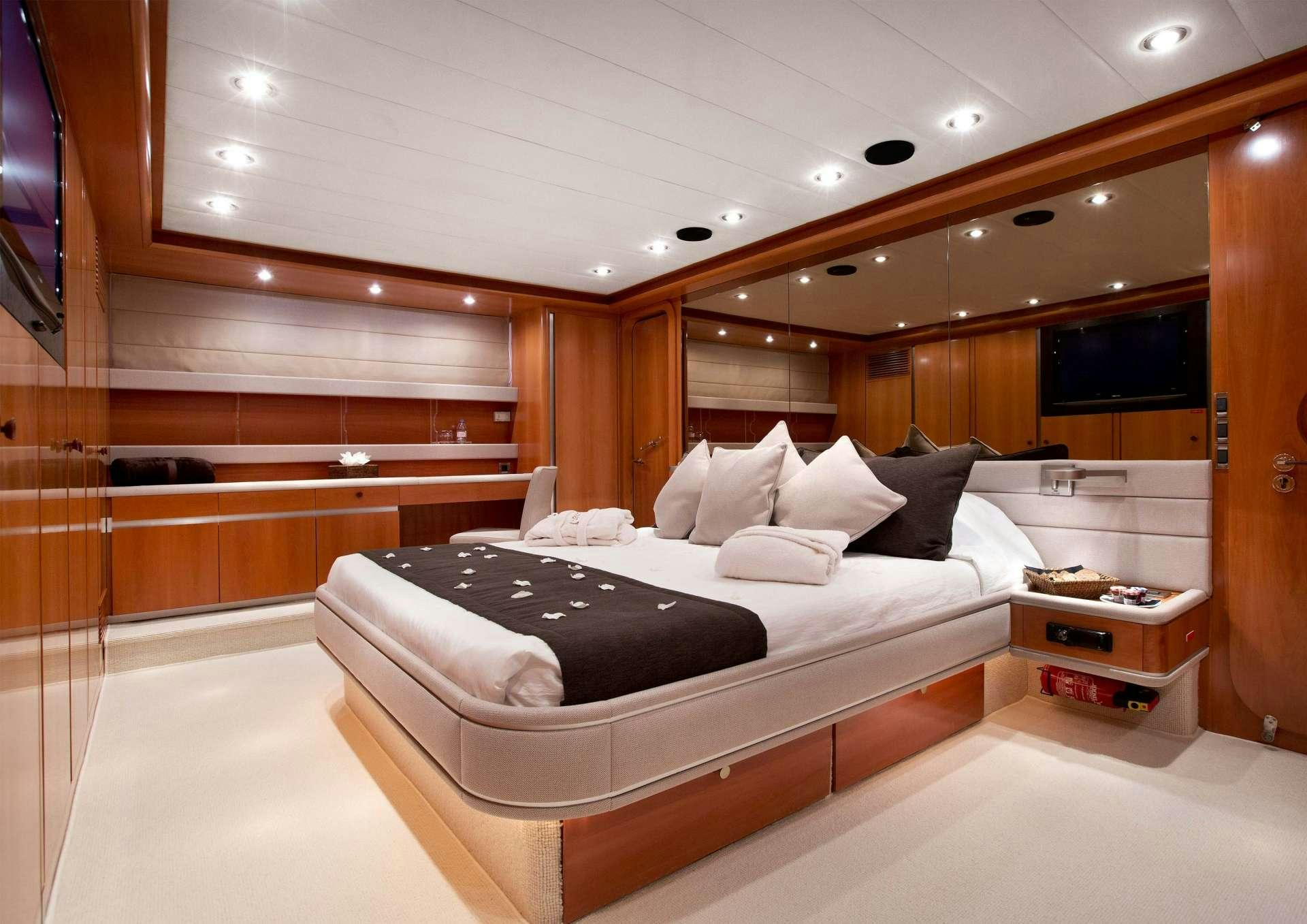 a bed in a room aboard SUNLINER X Yacht for Charter