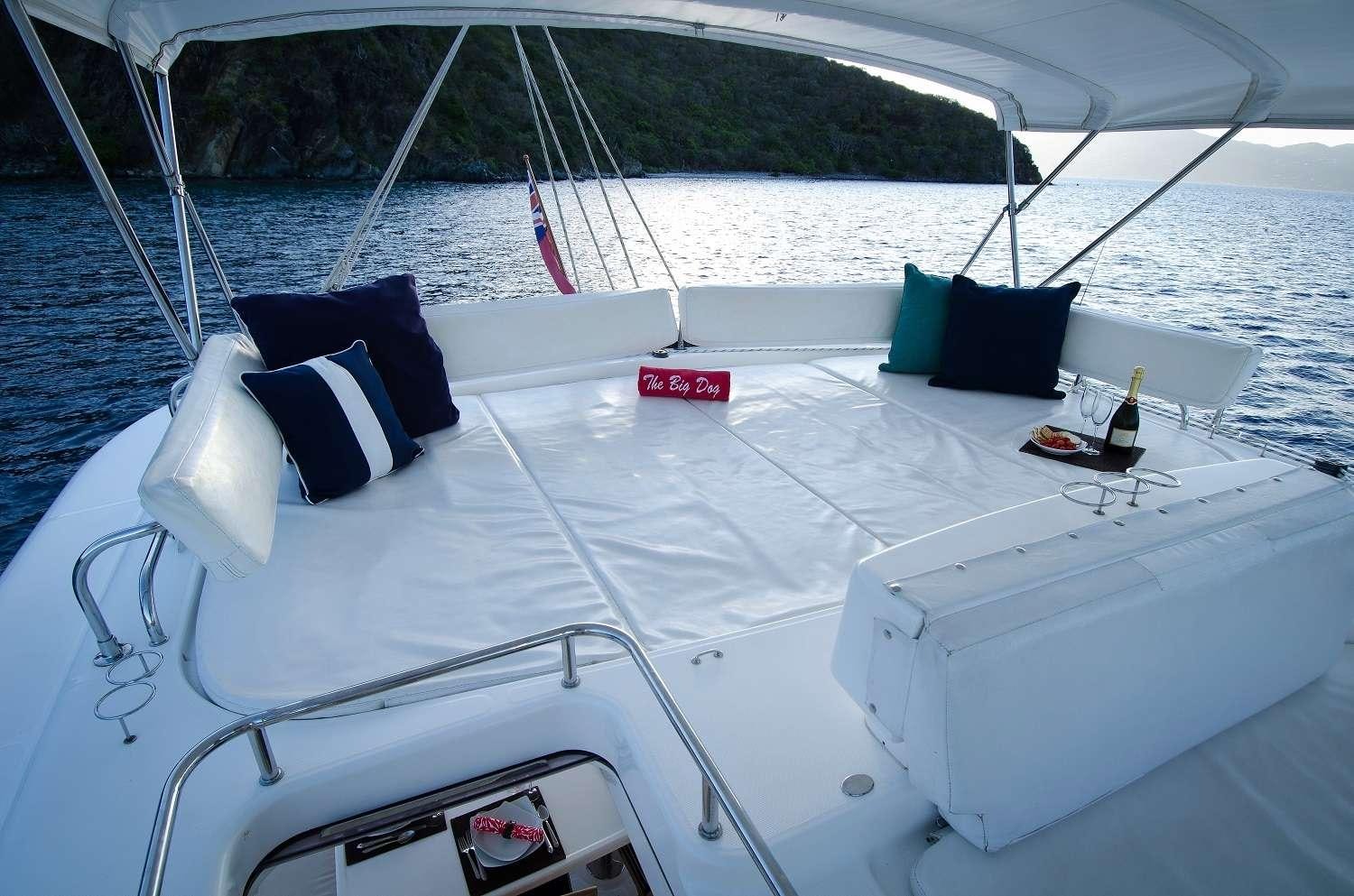 a boat with pillows on it aboard THE BIG DOG Yacht for Charter