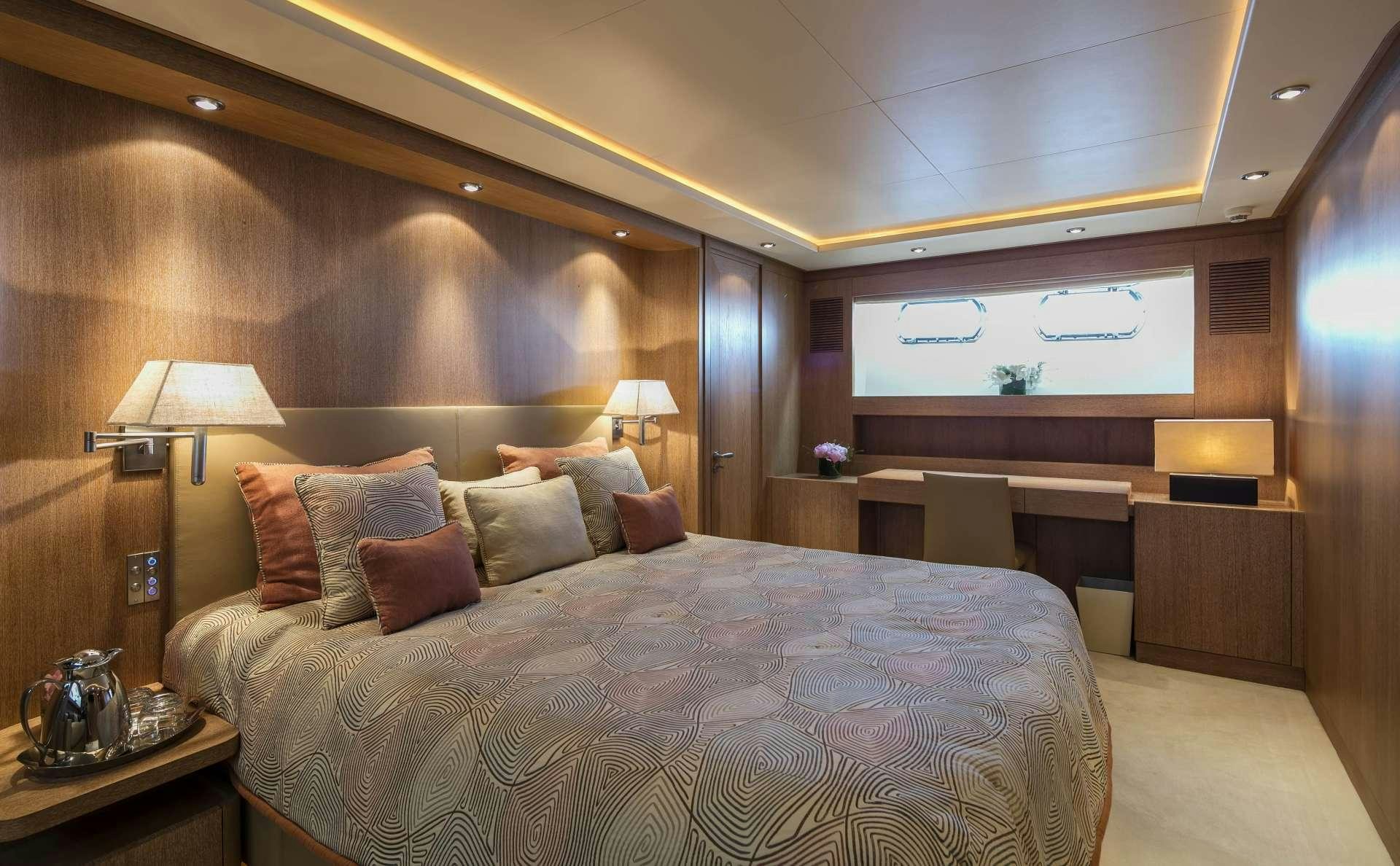 a bed in a hotel room aboard ALEXIA AV Yacht for Charter