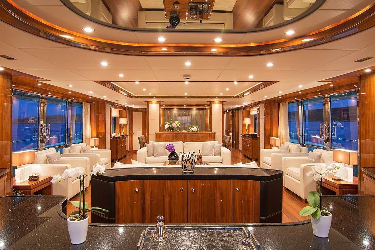 a large room with a large window aboard PATHOS Yacht for Charter
