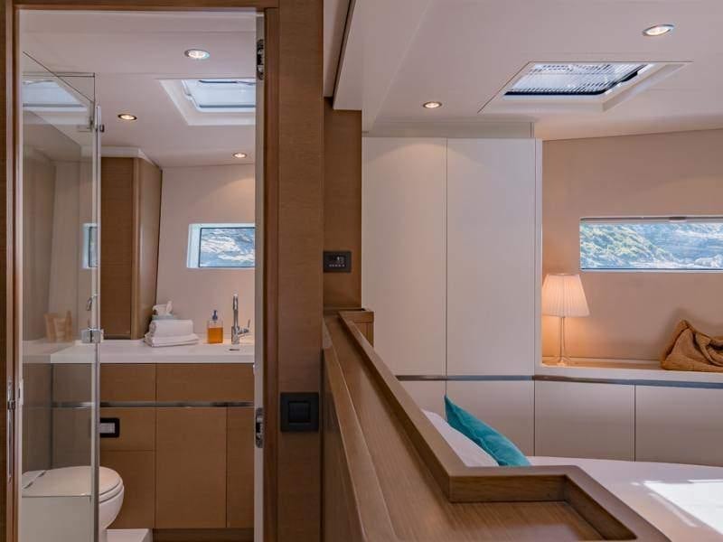 a bathroom with a glass shower aboard NEYINA Yacht for Charter