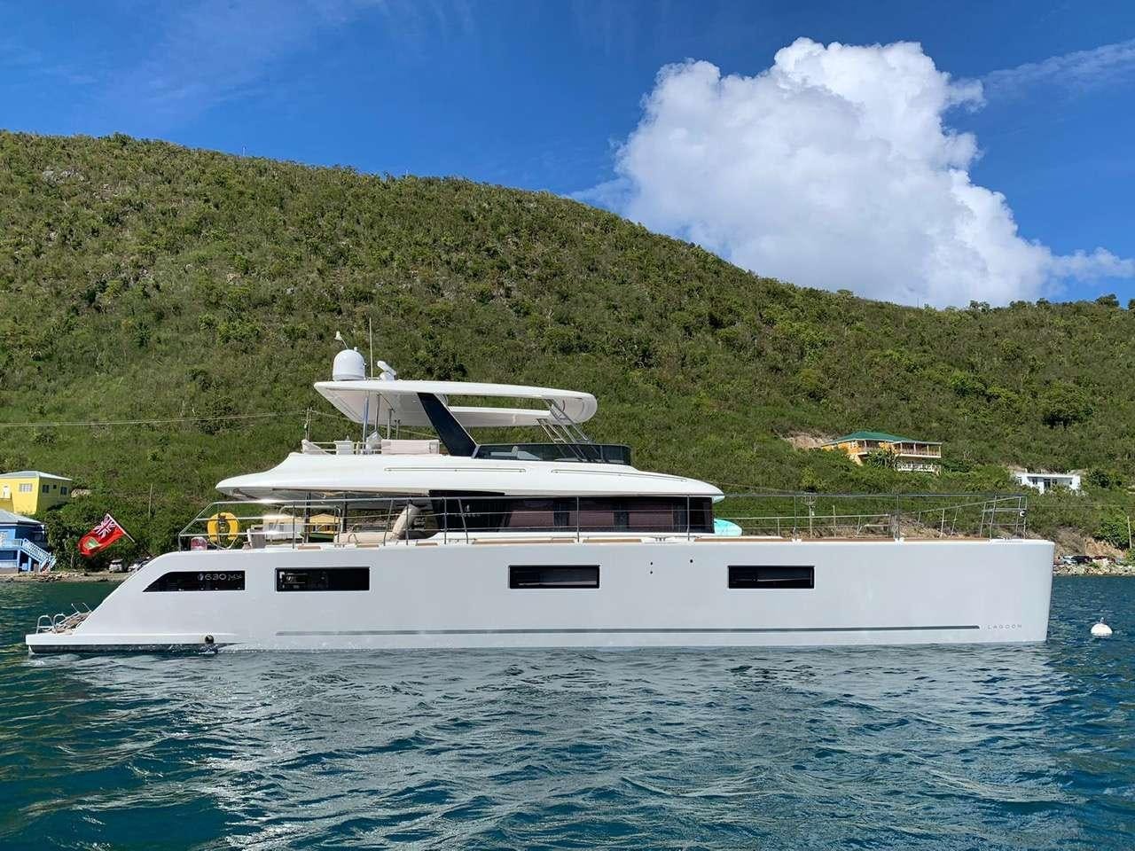 a white yacht on the water aboard LONG MONDAY Yacht for Charter