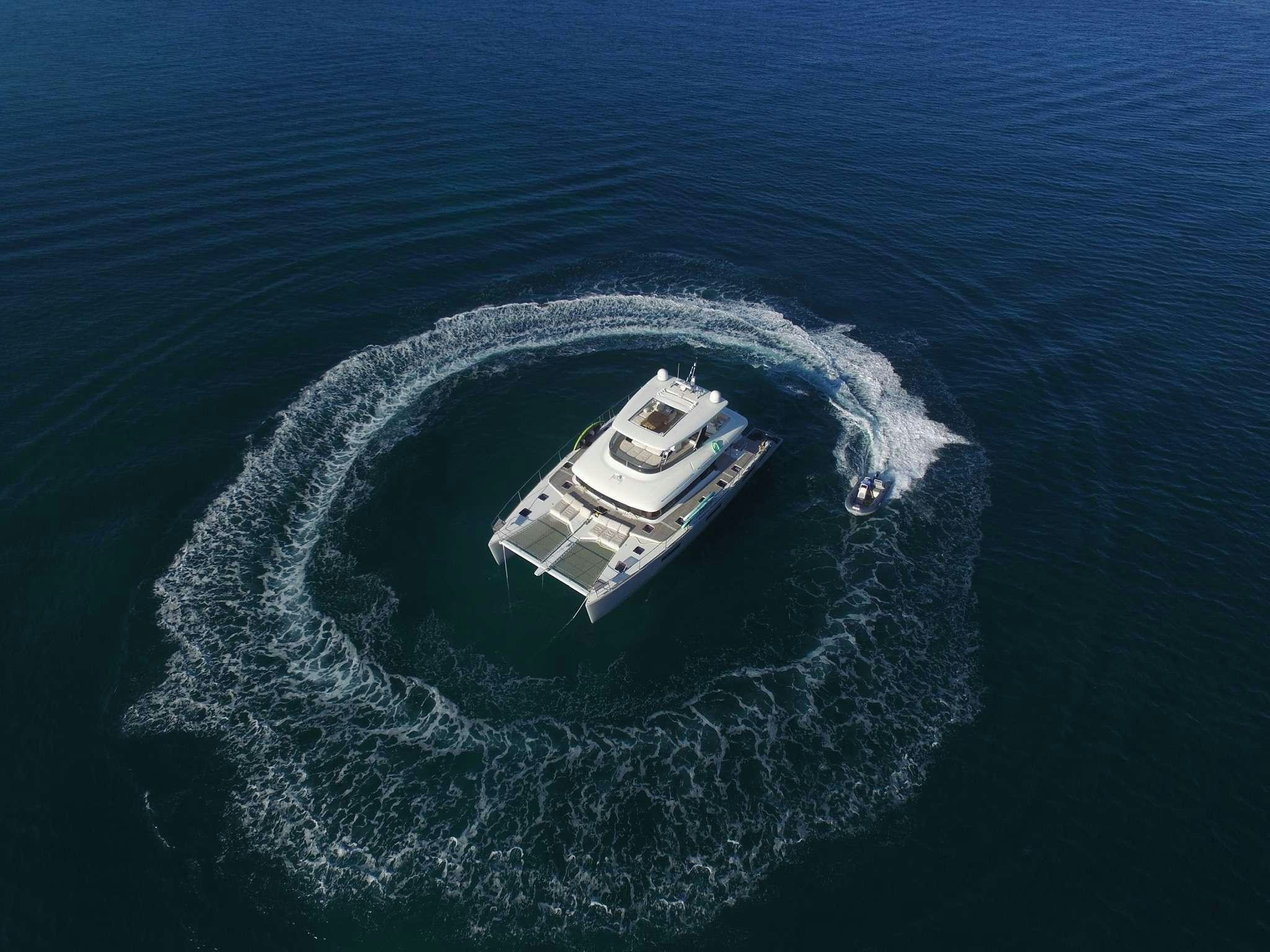 a ship in the ocean aboard LONG MONDAY Yacht for Charter