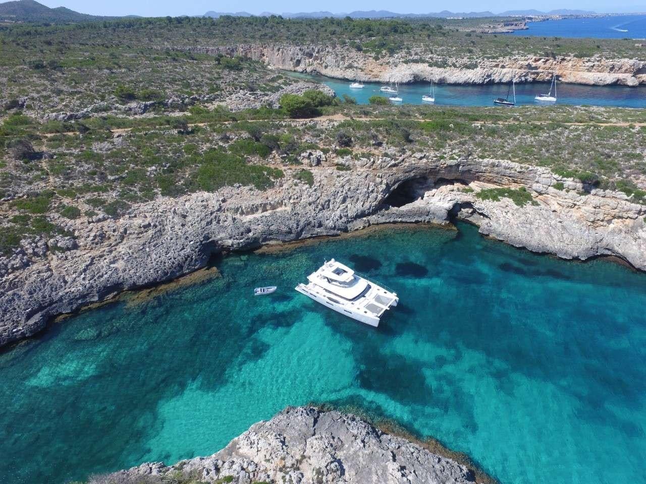 a boat on a body of water aboard LONG MONDAY Yacht for Charter