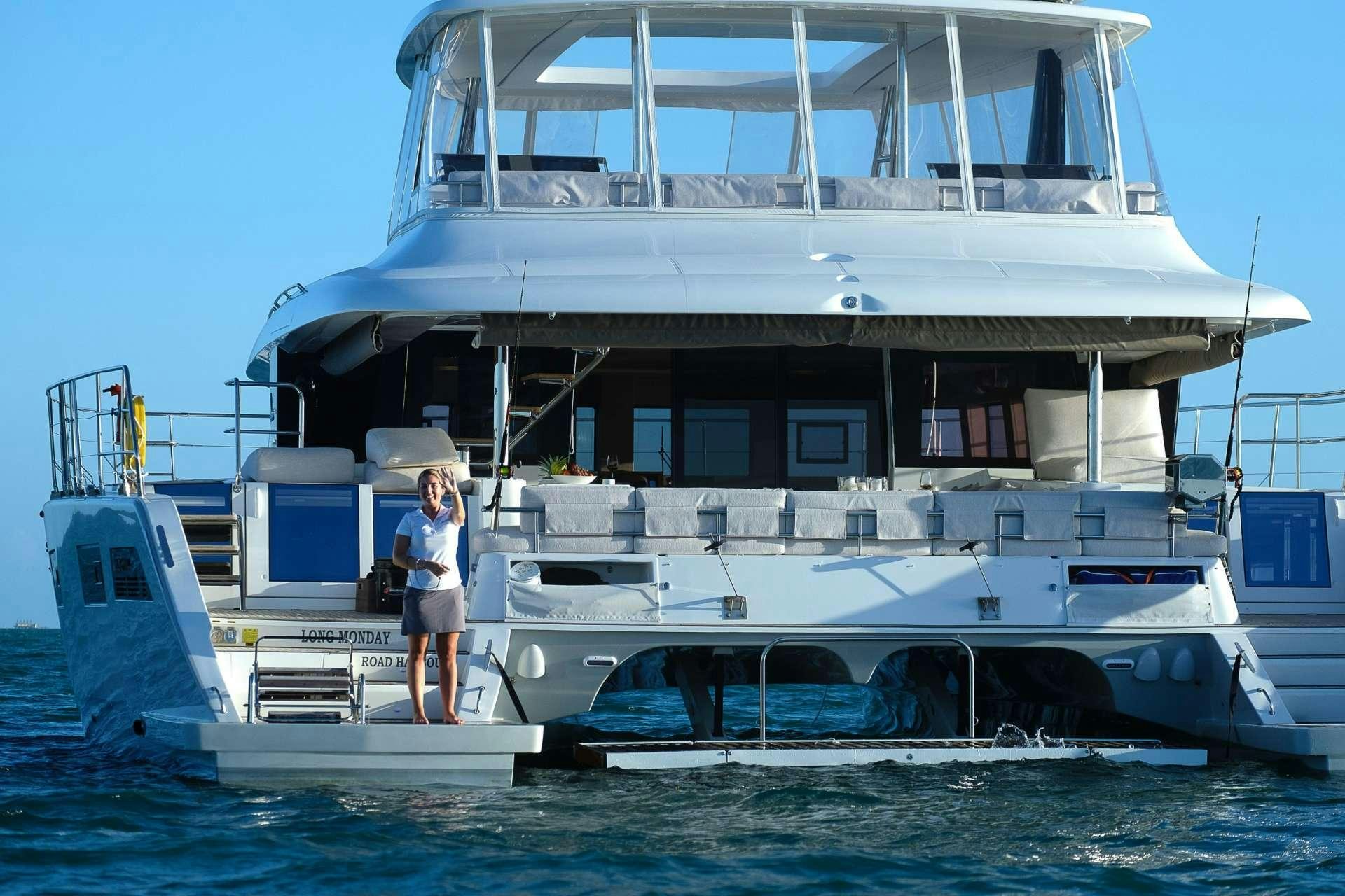 a person standing on a boat aboard LONG MONDAY Yacht for Charter