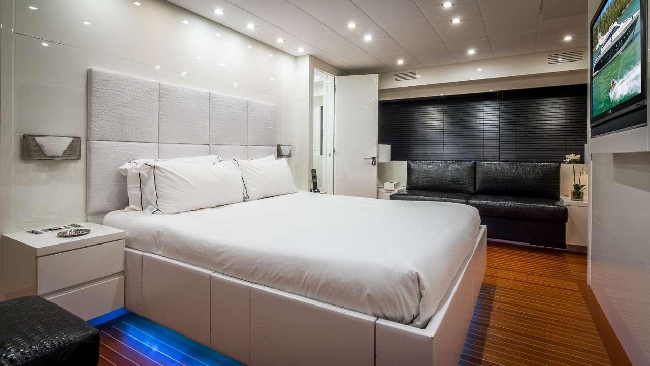 a bed in a room aboard FRIDAY Yacht for Charter