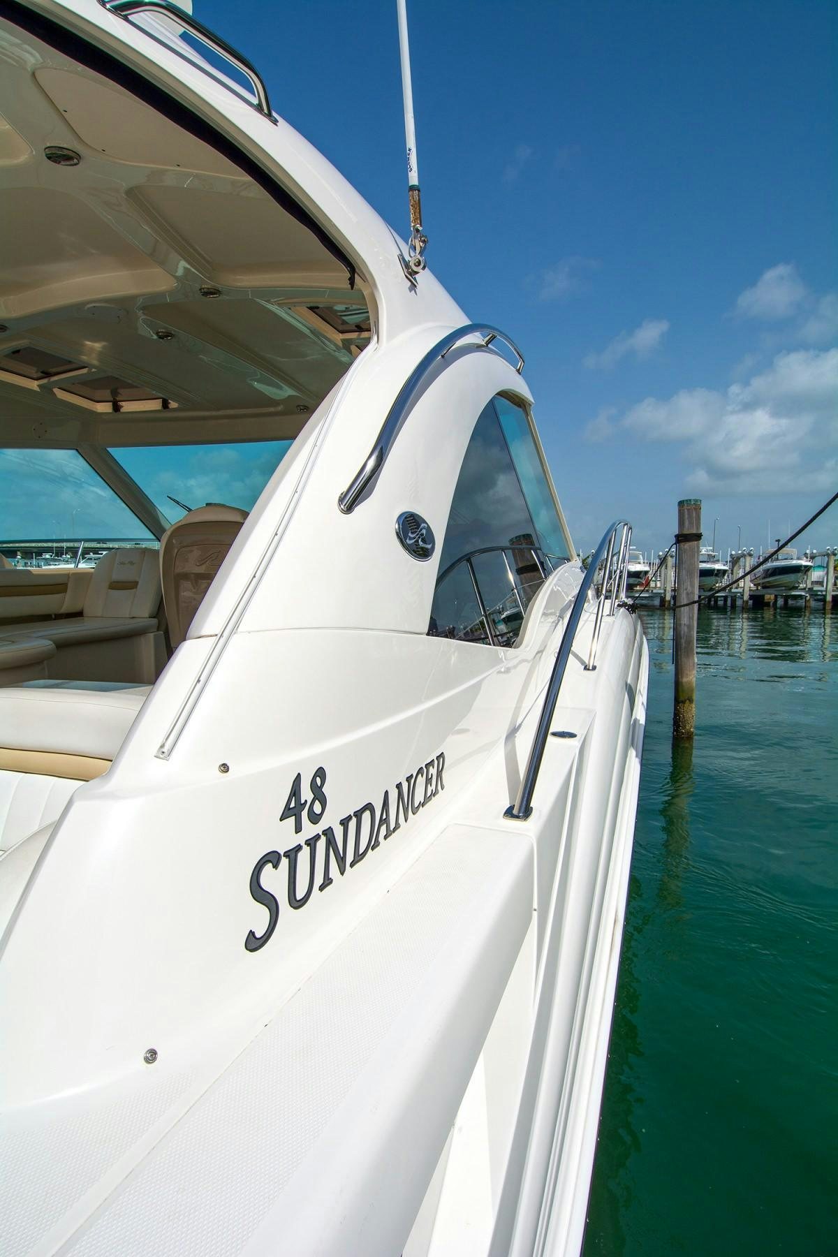 a white boat in the water aboard PIER PRESSURE Yacht for Charter