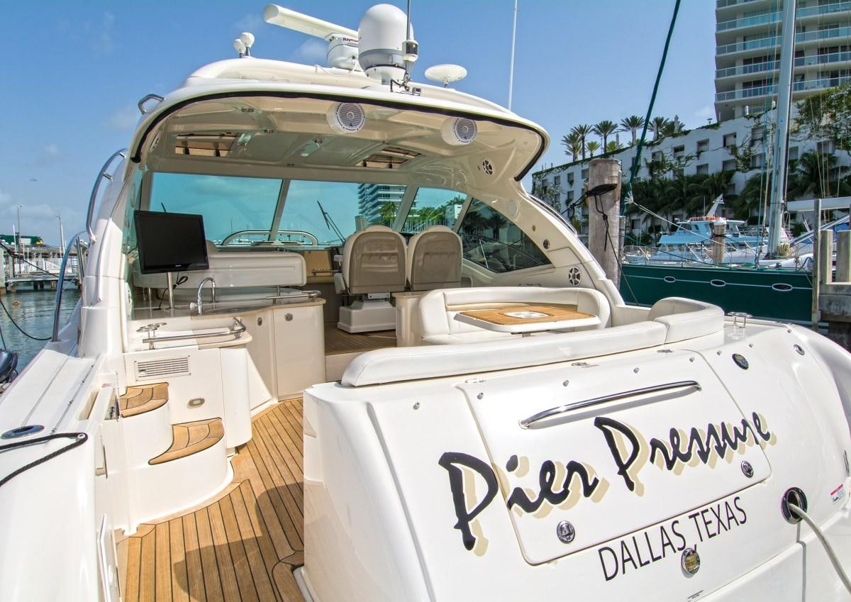 a white truck with a sign on the front aboard PIER PRESSURE Yacht for Charter