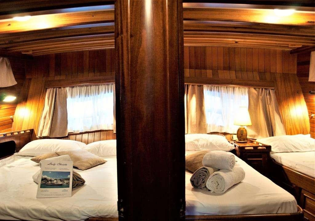 a room with two beds aboard Donna Marisa Yacht for Charter