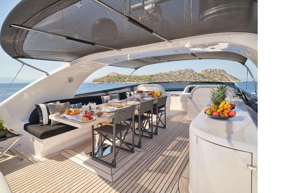 a modern kitchen with a large white roof aboard IRENE'S Yacht for Charter