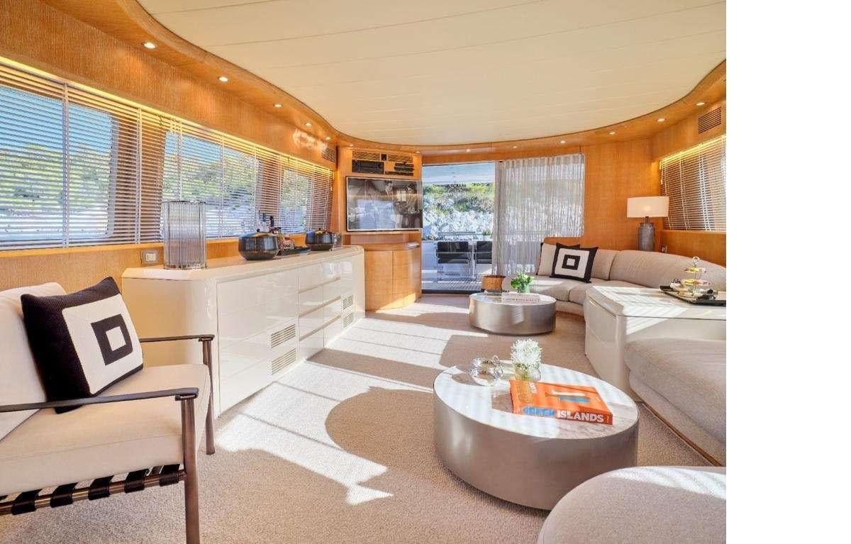 a living room with a large window aboard IRENE'S Yacht for Charter