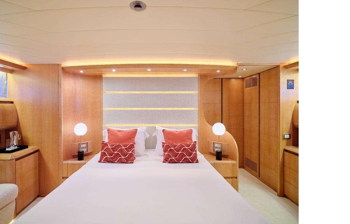 a bed in a room aboard IRENE'S Yacht for Charter