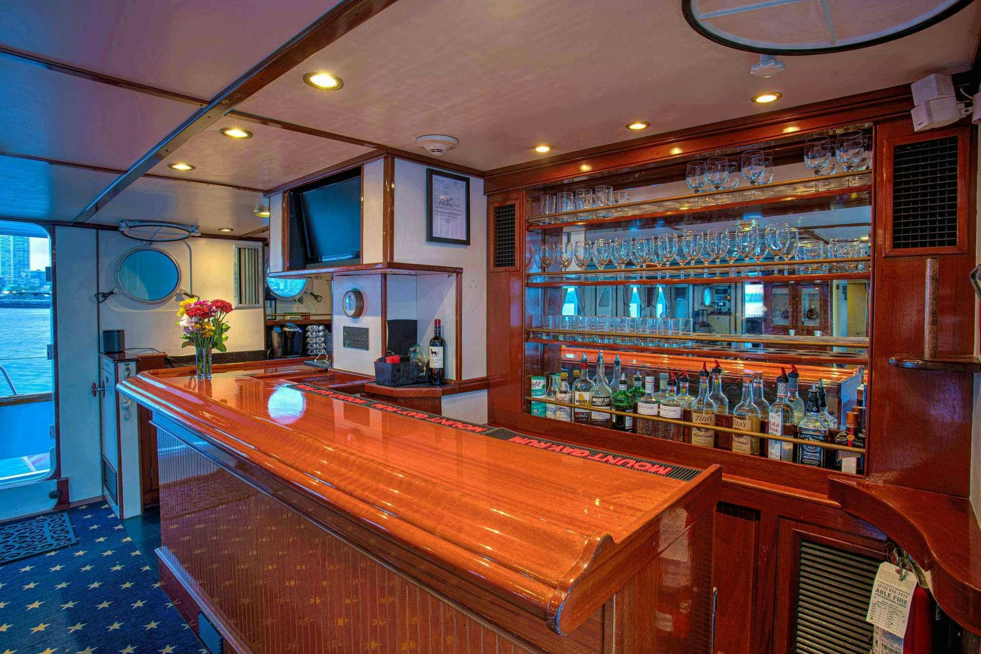 a bar with a bar and a bar aboard ARABELLA II Yacht for Charter