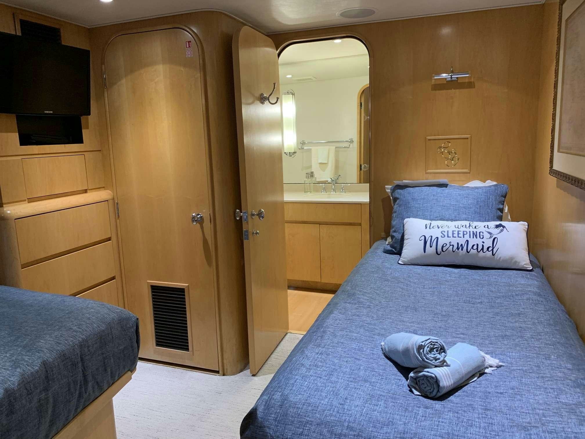a bed in a room aboard DENISE ROSE Yacht for Charter