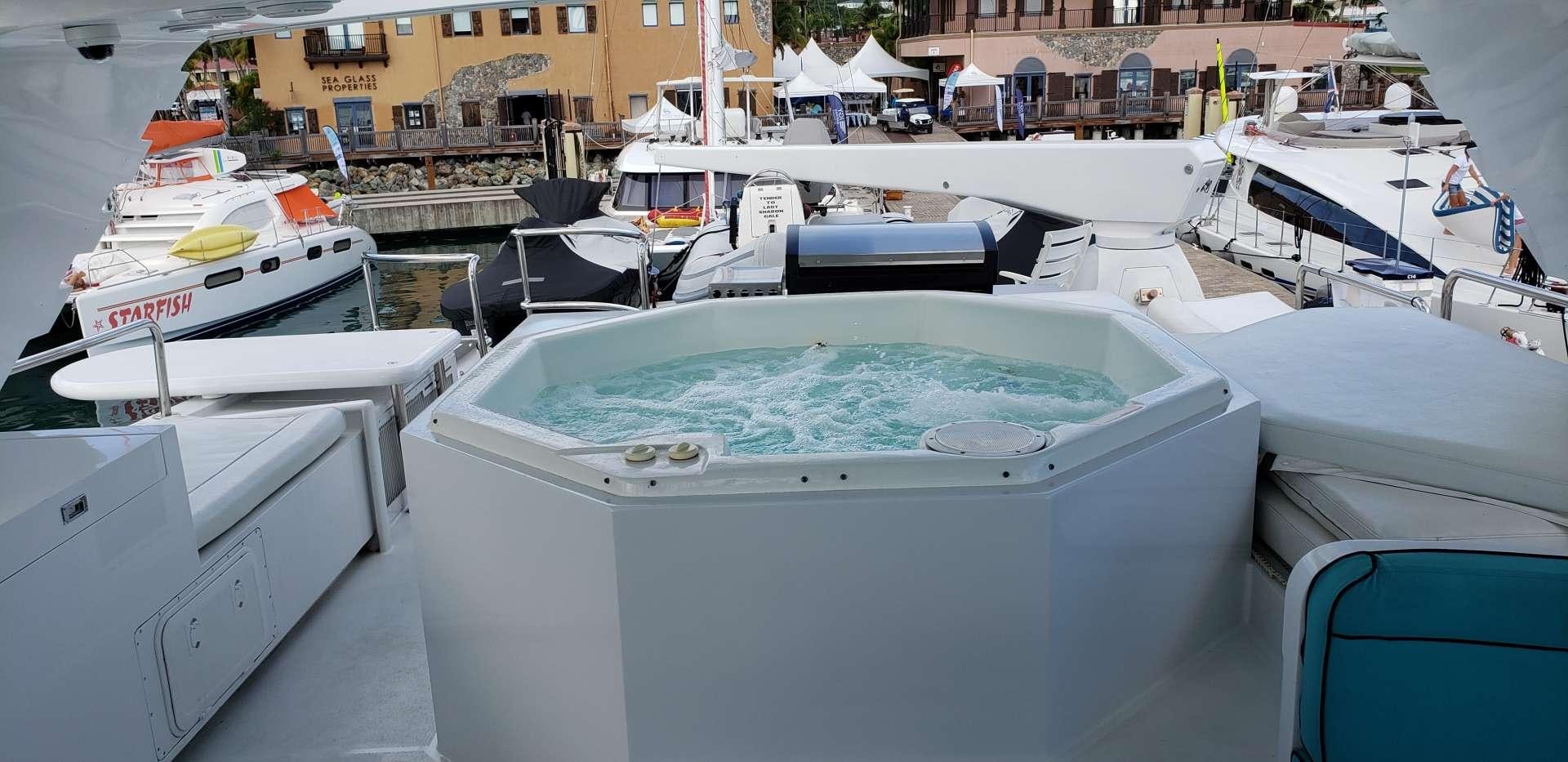 a group of boats in a harbor aboard DENISE ROSE Yacht for Charter