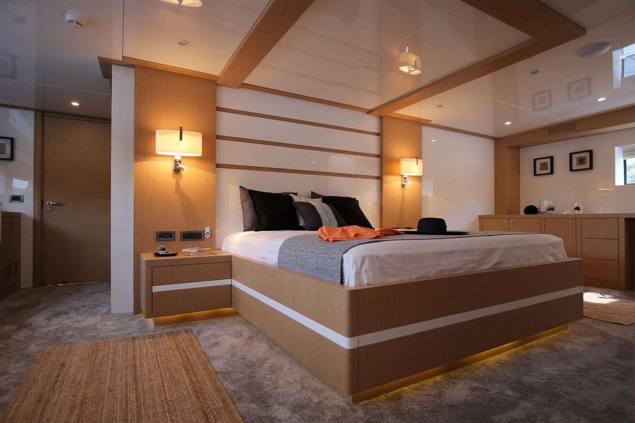 a bed in a room aboard OTTAWA IV Yacht for Charter