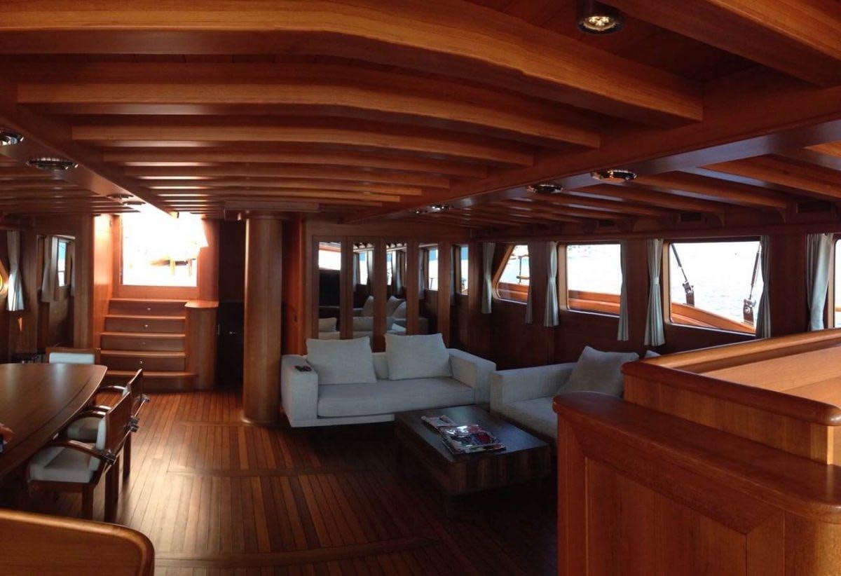 a living room with a wood ceiling aboard CAKIRYILDIZ Yacht for Charter