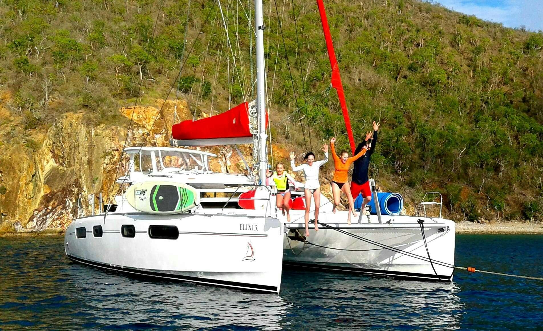 a group of people on a boat aboard ELIXIR Yacht for Charter