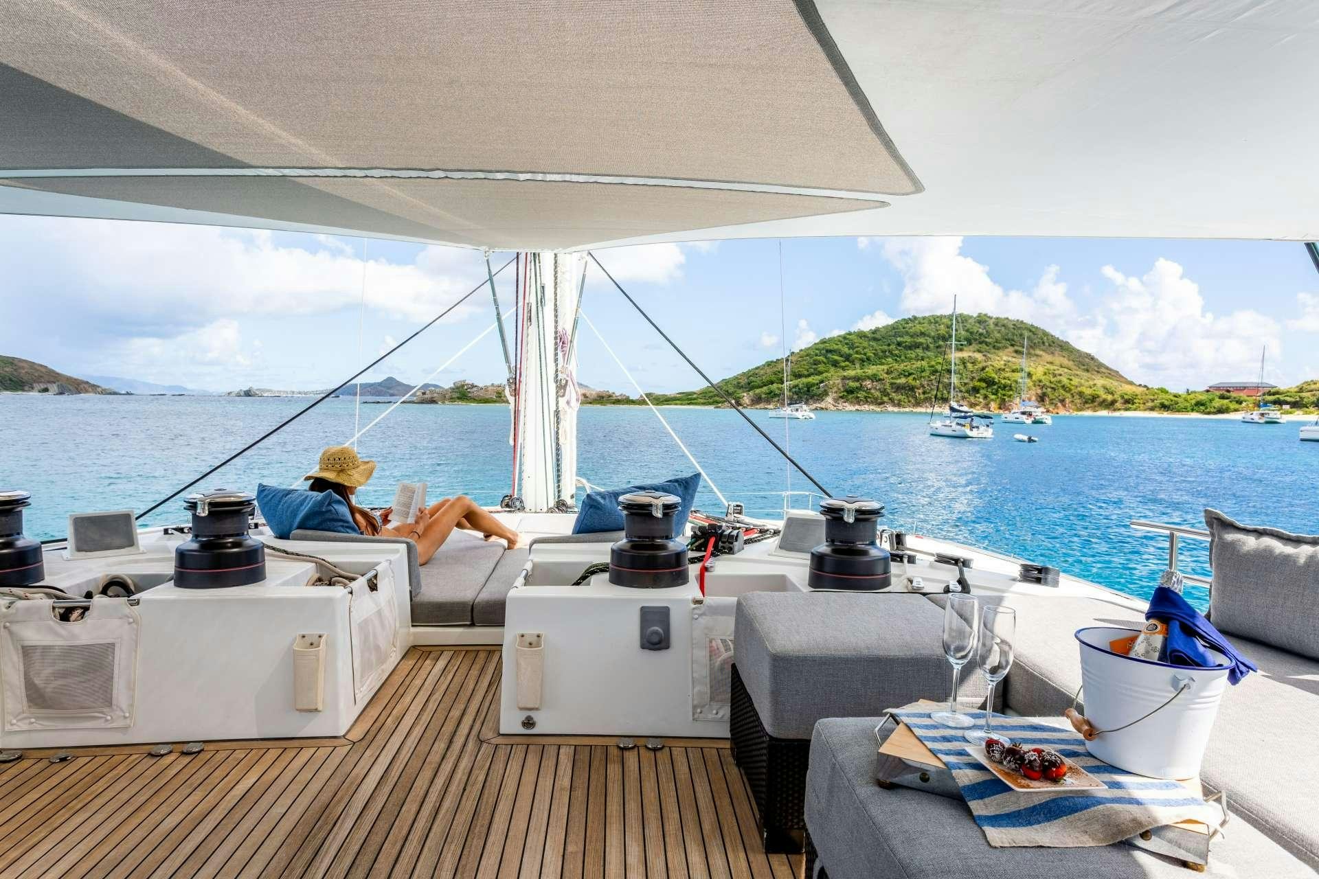 a person sitting on a boat aboard SERENITY NOW Yacht for Charter